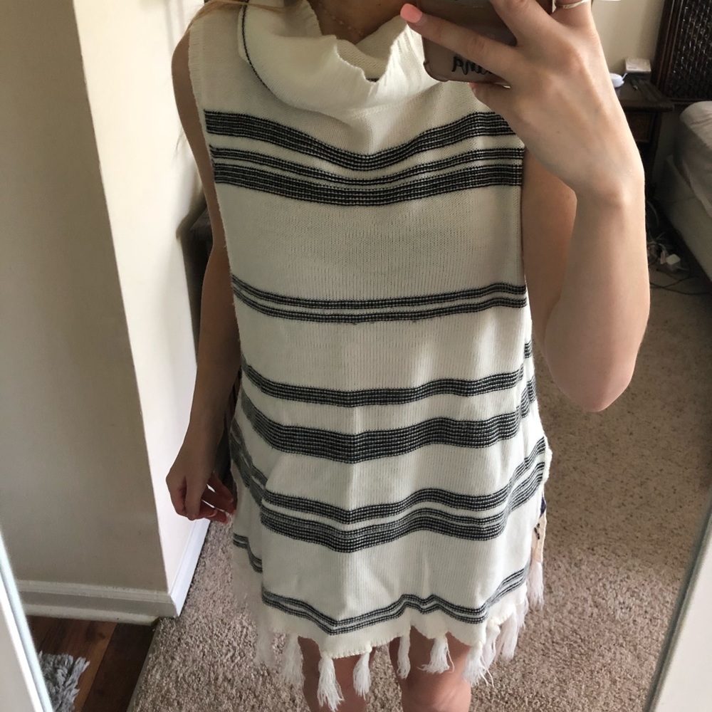 Black and white striped tank top with turtle neck
